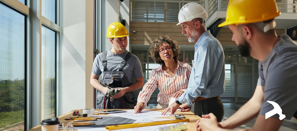 RWY-tenant-improvement-contractors Property Manager talking to tenant improvement contractors
