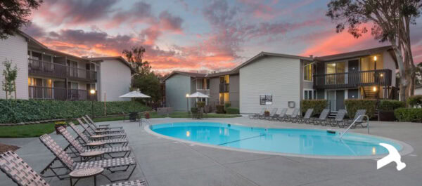 apartment building with a nice pool - multifamily property maintenance